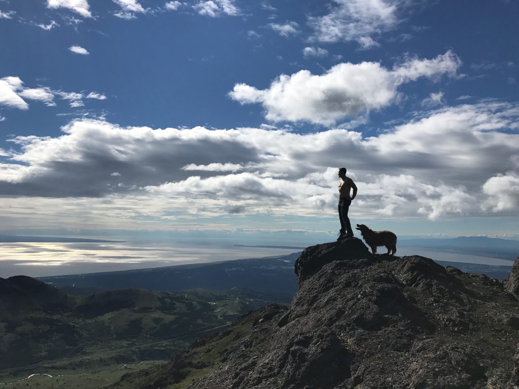 Noam at the summit of Little O'Malley overlooking Anchorage