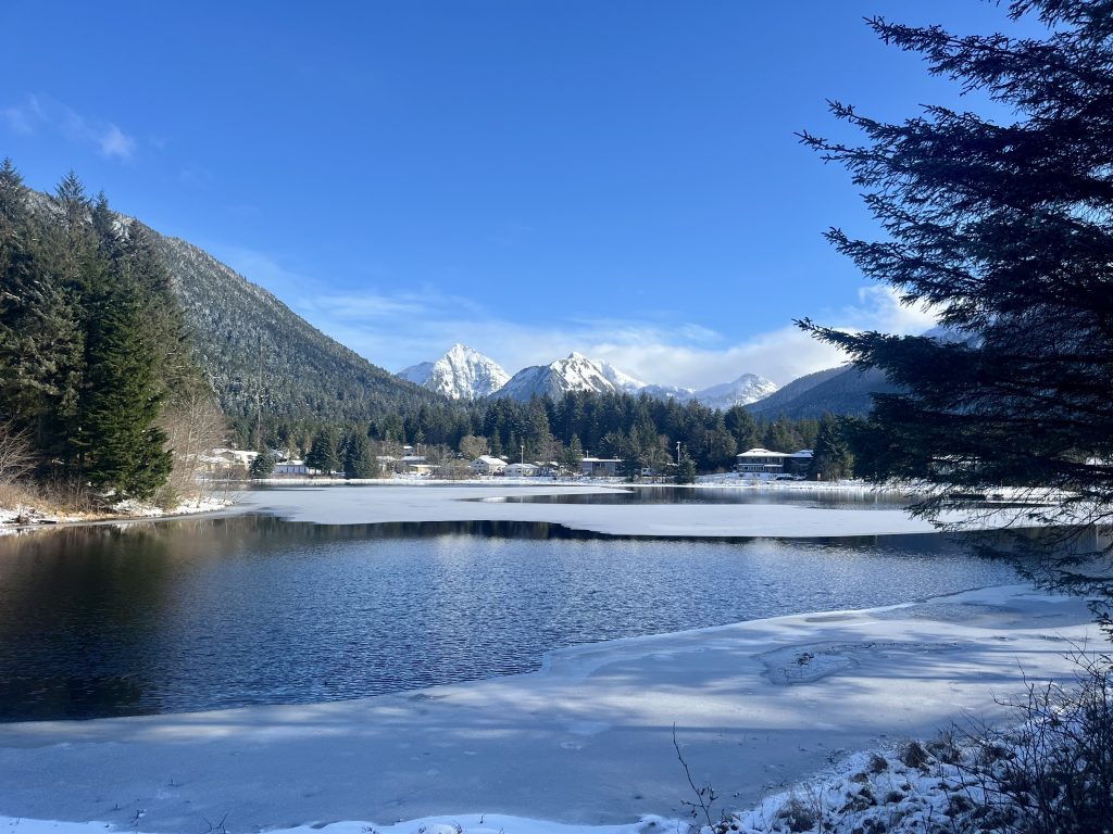 The view of Swan Lake during the winter in Sitka, Alaska with a backdrop of mountains